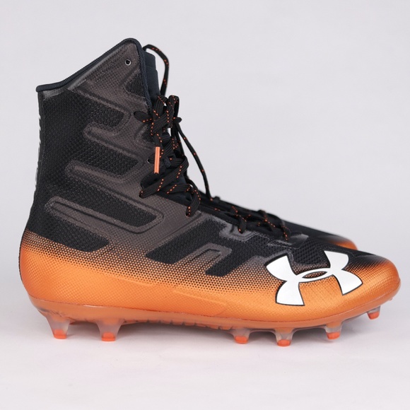 orange and black under armour football cleats